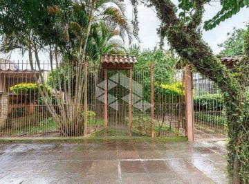 Casa · 210m² · 2 Quartos · 2 Vagas · Casa  2 dormitórios com 1 suíte para venda  no bairro Tristeza em Porto Alegre/RS.