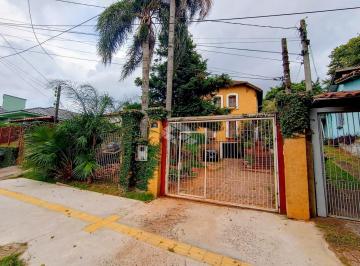 Casa · 306m² · 4 Quartos · 2 Vagas · Sobrado 4 dormitórios, lareira, suite e closet , piscina e 2 vagas no centro de Esteio