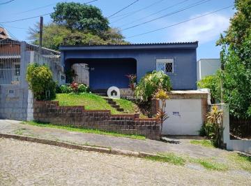 Casa · 206m² · 5 Quartos · 3 Vagas · Oportunidade Única na Cavalhada: Casa com 3 Dormitórios + Edícula Completa!