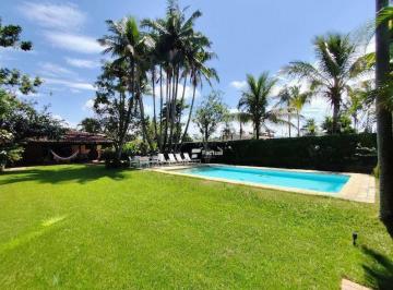6a7cd9f69a26eebb6d22c960ed481351f1ca4255 · Casa Térrea Charmosa com Estilo Rústico e Amplo Terreno – Praia de Pernambuco | Guarujá