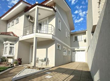 Casa · 218m² · 3 Quartos · 2 Vagas · Casa Sobrado com Piscina em Mont Serrat, Canoas - Oportunidade de Venda!
