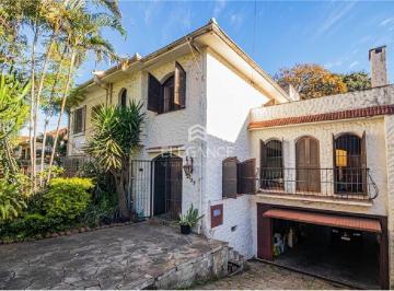 Foto 01 · Casa à venda com 5 quartos, 3 suítes e 400m² em Porto Alegre-RS