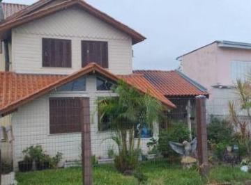 .jpg+2025-03-04 · Casa 3 dormitórios à venda Guarujá Porto Alegre/RS