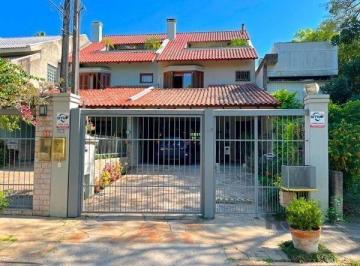 .jpg+2025-03-04 · Casa em Porto Alegre, no bairro Ipanema, com 3 dormitório(s), e 3 banheiros, à v