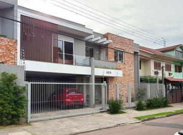 .jpg+2025-10-31 · Casa contemporânea, 4 d, sendo 2 suítes, uma no térreo,206 m² , bairro tristeza