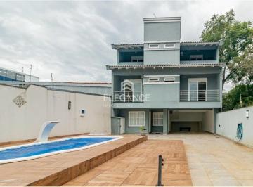 Foto 01 · Casa à venda em Porto Alegre-RS, Nonoai: 4 quartos, 1 suíte, 3 banheiros, 8 vagas de garagem, 369m².