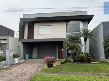 Casa · 290m² · 4 Quartos · 2 Vagas · Casa em condomínio fechado em Capão da Canoa