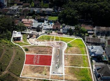 Foto 01 · Terreno a venda em condomínio fechado de alto padrão no bairro América em Joinville/SC.