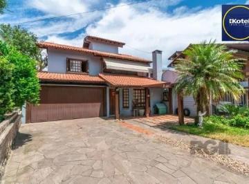 .jpg+2025-03-05 · Residência com 4 dormitórios á venda no Bairro Jardim Izabel.