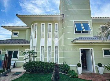 b2c04a79-09fc-4d09-8368-dd7386c1fa82-17694510459427.jpg · Casa frente mar com 4 suítes em Cacupé Florianópolis