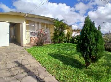 Casa · 110m² · 3 Quartos · 3 Vagas · Ampla casa com patio no bairro Rubem Berta .