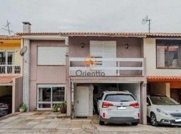 Casa · 240m² · 4 Quartos · 2 Vagas · Casa em condomínio no bairro Santo Antônio de 4 dormitórios e 2 vagas