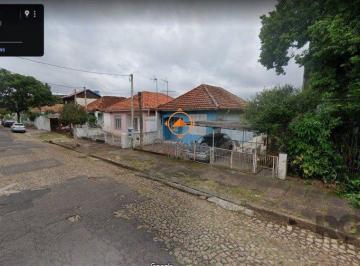 Casa · 250m² · 2 Quartos · 1 Vaga · Terreno com 3 casas, no bairro Cristo Redentor, em Porto Alegre, RS.
