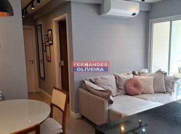 Foto 01 · Apartamento de 2 quartos com suíte em Santo Amaro, São Paulo-SP: 68m², sala, banheiro e vaga de gara