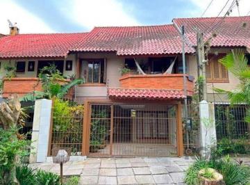 .jpg+2025-03-04 · Casa em Porto Alegre, no bairro Guarujá, com 3 dormitório(s), e 3 banheiros, à v