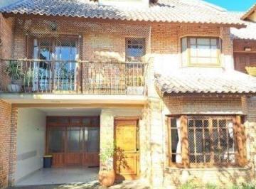 Casa · 268m² · 4 Quartos · 2 Vagas · Casa em condomínio em Ipanema de 3 dormitórios e 2 vagas