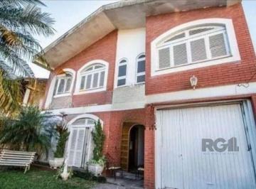 Casa · 242m² · 4 Quartos · 3 Vagas · Casa sobrado no bairro Tristeza de 4 dormitórios 3 vagas
