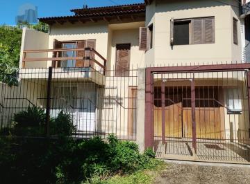 Casa · 287m² · 3 Quartos · 4 Vagas · Casa com 3 quartos, 4 vagas de garagem e com pátio no bairro Parque Santa Fé