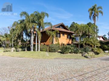 Casa · 385m² · 6 Quartos · 5 Vagas · Casa à venda no Terra Ville com 6 dormitórios e fundo para o lago.