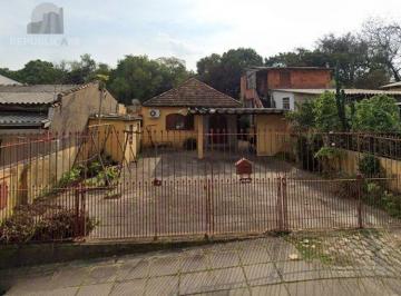 Casa · 70m² · 3 Quartos · 4 Vagas · Excelente imóvel com terreno amplo à venda no Jardim Itu – Porto Alegre