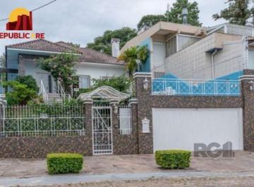 .jpg+2025-03-04 · Casa em Porto Alegre, no bairro Vila Assunção, com 3 dormitório(s), e 3 banheiro