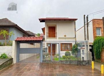 .jpg+2025-03-04 · Casa em Porto Alegre, no bairro Tristeza, com 3 dormitório(s), e 3 banheiros, à