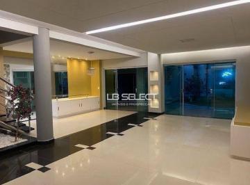 1a96b013a5b45072d3c4248b54d5baa9aaf4eb2e · Casa no condomínio Paradiso Ecológico com quatro quartos, duas suítes e área gourmet.