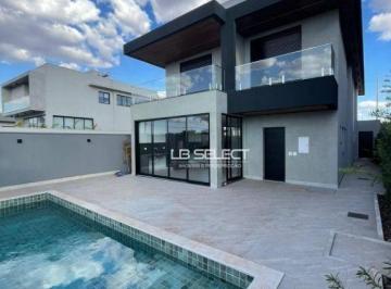 2063c84e28ec6a1cb8c901b20408ec06789a5d8c · Casa no Condomínio Tamboré com quatro suítes e varanda gourmet.