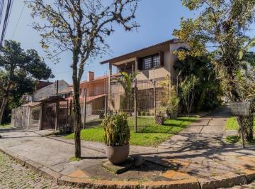 Casa · 258m² · 4 Quartos · 3 Vagas · Casa individual de esquina, Bairro Espírito Santo no Loteamento Altos do Ipê.