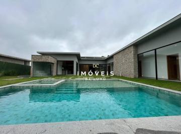 ed2b58648d5ea31ac72f76780beb1f0ac63ec708 · Casa nova térrea com 5 suítes e fundo para área de preservação no Condomínio Terras de São José II, 