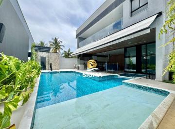 ca7b10d5314f708fe123c003941f025cc2bb3141 · Casa com 6 dormitórios à venda, 460 m² por R$ 4.950.000 - Jardim Acapulco - Guarujá/SP.