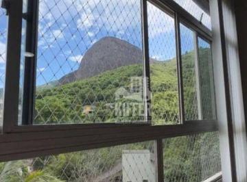 Sala  · Apartamento no Grajaú – 2 quartos (1 suíte), 80m², vista para a montanha