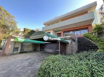 Casa · 430m² · 4 Quartos · 2 Vagas · Casa de 4 quartos, 2 suítes e 2 vagas de garagem no bairro Boa Vista em POA
