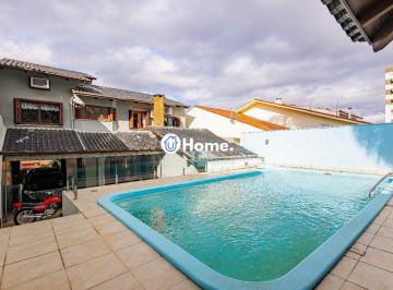 Casa · 208m² · 4 Quartos · 3 Vagas · Casa de 4 dormitórios e 208m² à venda no Bairro Jardim Botânico, Porto Alegre.