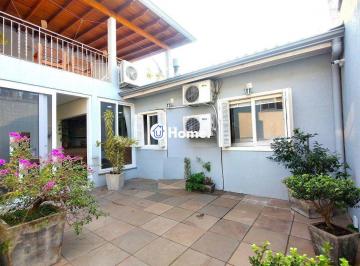 Casa · 220m² · 4 Quartos · 2 Vagas · Casa com 4 dormitórios, espaço gourmet e terraço na Zona Norte de Porto Alegre