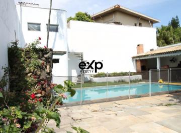 Piscina · Casa térrea no City Caxingui para viver em paz: piscina, área gourmet, quintal amplo e canil, a 500m