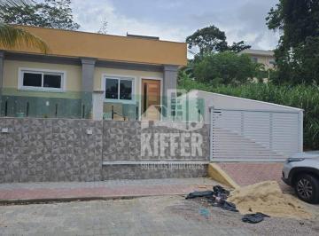 Fachada moderna da casa em condomínio fechado · Casa Alto Padrão em Condomínio Fechado | 3 Quartos (2 Suítes) | 120m² | Terreno 360m²