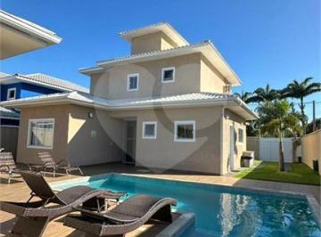 Casa · 215m² · 4 Quartos · 2 Vagas · Condomínio com 4 quartos à venda em Caravelas - RJ