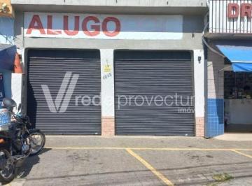 0 · Sala comercial com 115 metros úteis , 02 vagas de garagem , 02 portas de aço