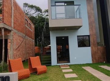 Foto 01 · Casa em Condomínio na Equitação em Itanhaém-SP: 2 quartos, 1 suíte, 1 sala, 3 banheiros, 2 vagas por