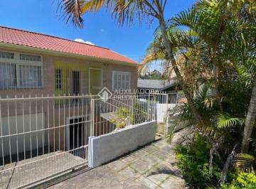 Casa · 190m² · 4 Quartos · 3 Vagas · Casa  a venda de 4 quartos com amplo pátio e 3 vagas de garagem no bairro Partenon.