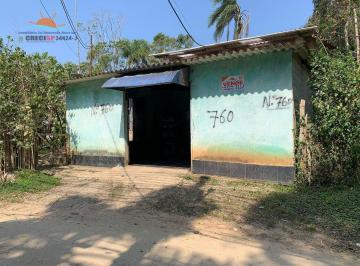 i1.jpg · Vende-se um terreno com duas casas.