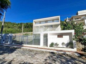 7d19a76c-084a-4c94-99cc-ecc1848359b5-17728190546149.jpg · Casa de alto padrão com vista mar na Praia Brava, Florianópolis/SC