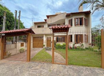 Casa · 257m² · 3 Quartos · 3 Vagas · Casa com 3 quartos e 257 m² com vista para o Guaíba.