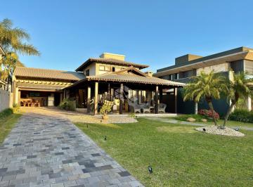 Photo 1 · Casa térrea com 3 dormitórios, lote com 502m² no condomínio fechado Capão da Canoa