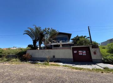 Foto 01 · Casa com 3 quartos sendo uma suíte no centro de barra velha