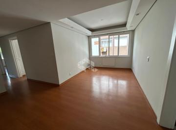 Sala, com sol da manhã. · Apartamento à venda de 03 dormitórios no bairro Moinhos de Vento em Porto Alegre /RS