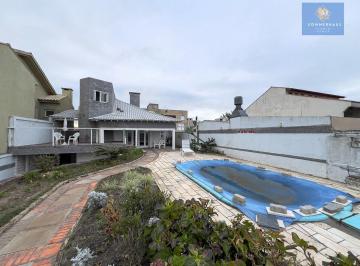 Casa · 325m² · 7 Quartos · 2 Vagas · Sobrado na beira mar de Xangri Lá