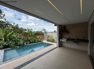Foto 01 · Casa de alto padrão em condomínio - 3 quartos, 3 suítes, ambientes integrados, área gourmet, piscina