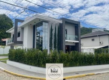 Foto 01 · Imperdível! Casa de luxo com 4 suítes e 3 vagas de garagem em Balneário Camboriú-SC, bairro Ariribá 